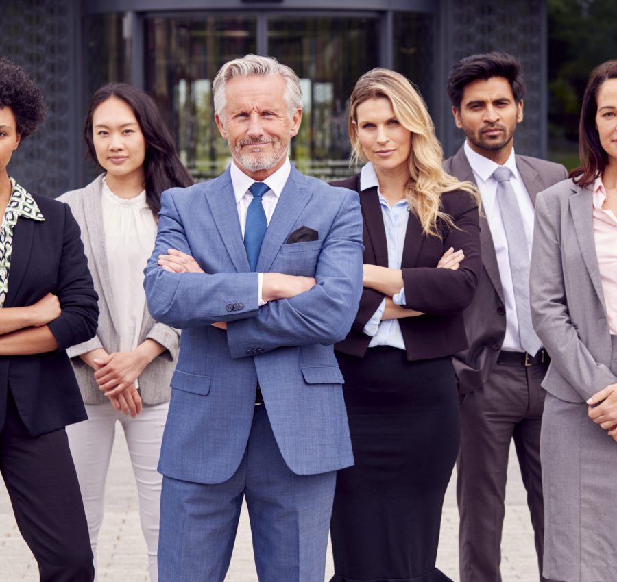 Portrait Of Multi-Cultural Business Team Outside Modern Office Building